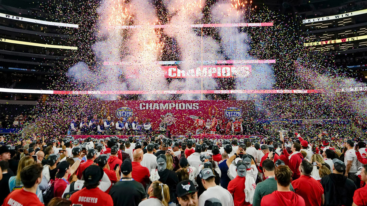 Confetti and pyrotechnics erupt as Ohio State Buckeyes head coach Ryan Day hoists the Field Scovell Trophy following the 28-14 win over the Texas Longhorns in the Cotton Bowl Classic College Football Playoff semifinal game at AT&T Stadium