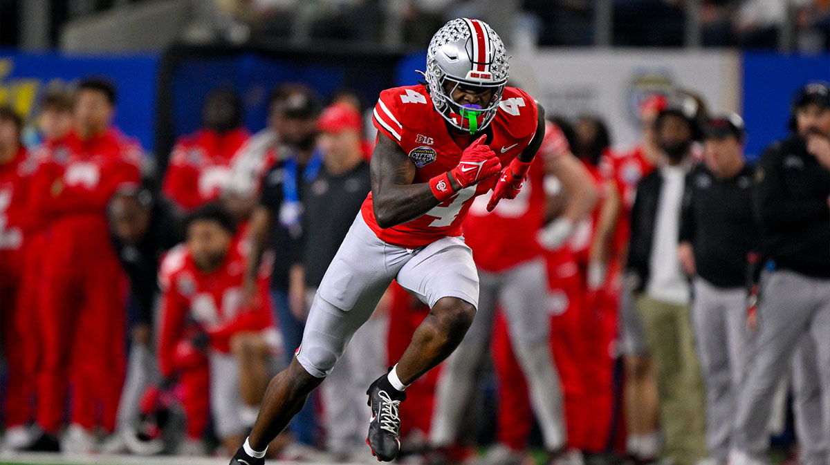 Ohio State Buckeyes wide receiver Jeremiah Smith (4) in action during the game between the Texas Longhorns and the Ohio State Buckeyes at AT&T Stadium.