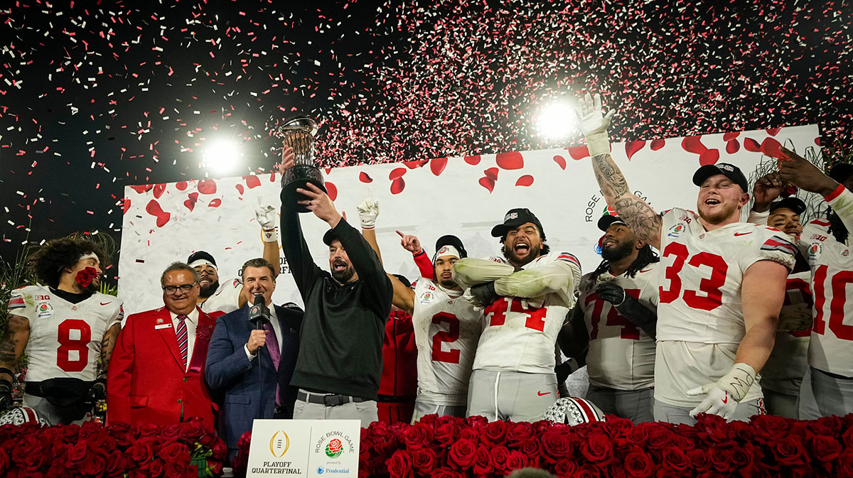 Ohio State Buckeyes head coach Ryan Day hosts the Leishman Trophy following the 41-21 win over the Oregon Ducks in the College Football Playoff quarterfinal at the Rose Bowl in Pasadena, Calif. on Jan. 1, 2025.