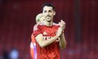 Aberdeen striker Bojan Miovski applauds supporters after the 2-1 win over Airdrieonians. Image: Shutterstock.