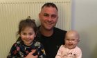 Jordan Weir with his eldest daughter Amelie, and baby daughter Wynter-Rose, right.