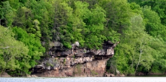 Site of Van Bibber's Leap, Van Bibber's Rock rises above the Kanawha River below Kanawha Falls.