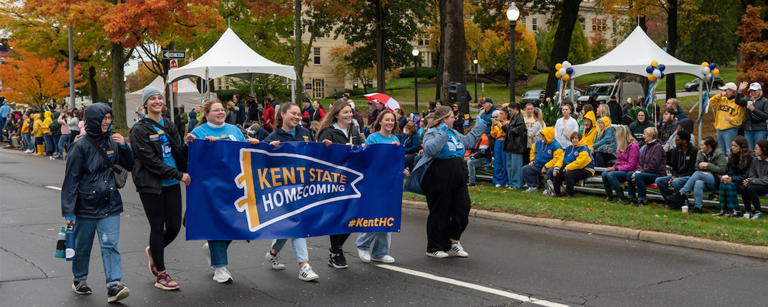 Kent State University alumni, students, employees and community members gather to watch the university’s 2023 Homecoming Parade.