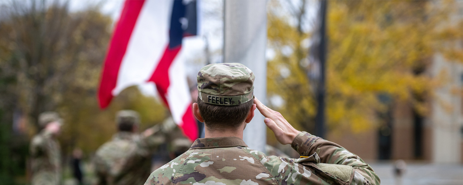 A Kent State University Army ROTC cadet salutes during the university’s 2023 Veterans Day Commemoration.