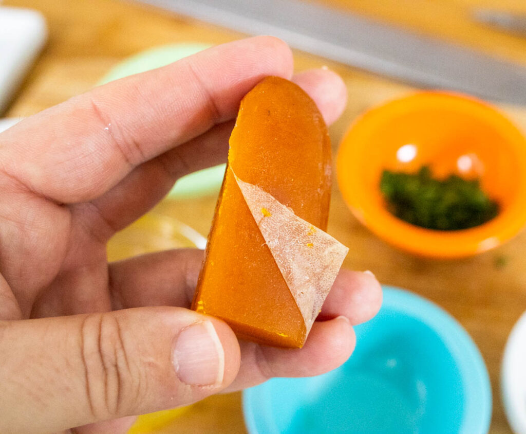 Bottarga being unpeeled