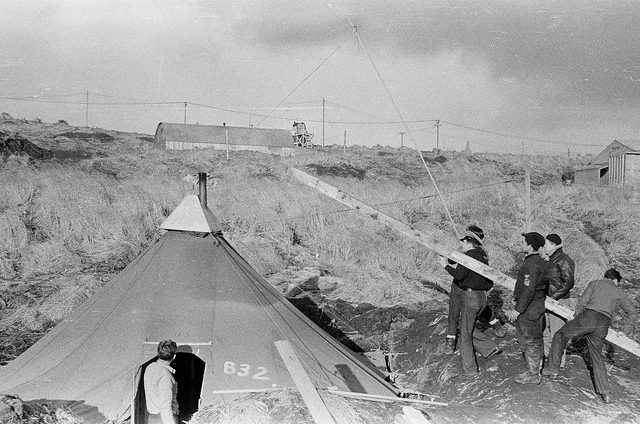 Servicemen at work / Adak 1/10/43. [Men, left to right] AMM 1/c Bill Maris, CNAP Bill Dunn, ARM ½ Chandler, AMM 3/c Barnett, AMM 1/c Strattos – Author: Alex Lindeman – CC by 2.0