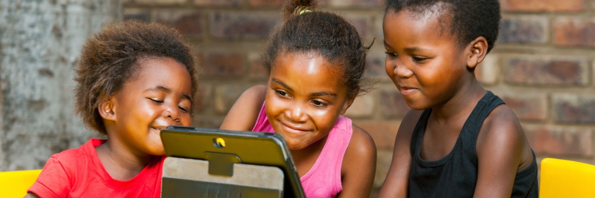 Kindergarten age children learning online. 