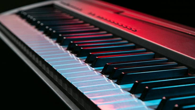 digital piano under blue and red mood lights