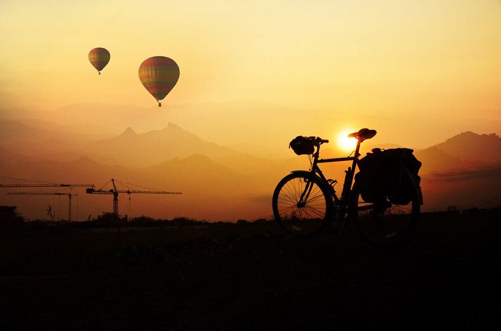 landscape with hot air balloons and bicycle asymmetrical balance in photography