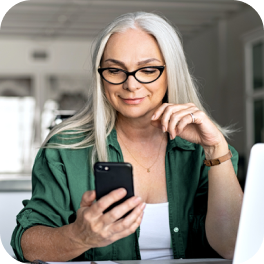 Woman looking at her phone while taking the ADT quiz