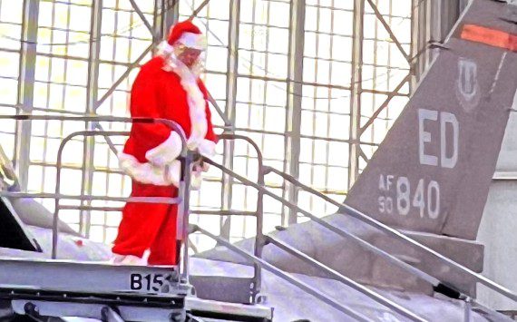 Santa arrives in F-16 (Courtesy photos Atherine Blanco Coffee4Vets)