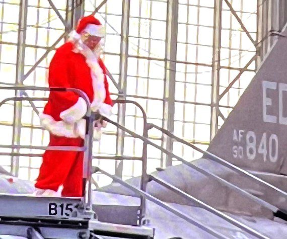 Santa arrives in F-16 (Courtesy photos Atherine Blanco Coffee4Vets)