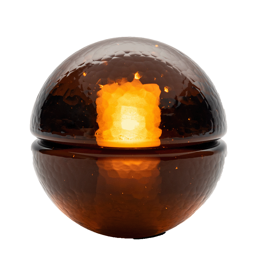 amber glass orb with light inside glass