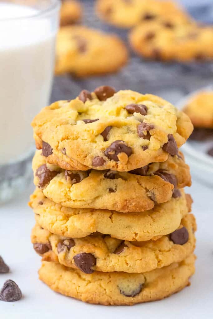 yellow cake mix cookies stacked on a table