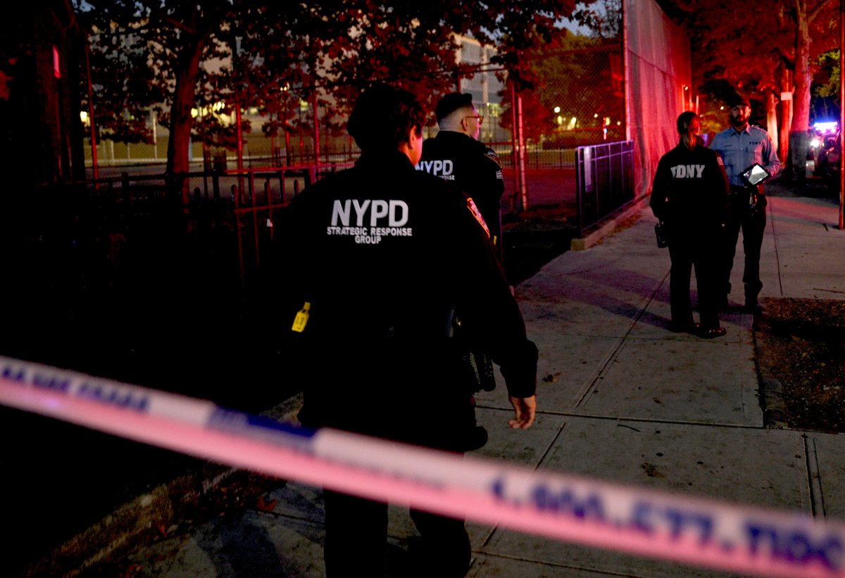 FILE - Brooklyn police at a shooting scene