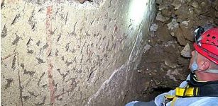 A 2000-year old frescoed room has been discovered under a busy Roman street. Photo:Archaeological Superintendency Rome