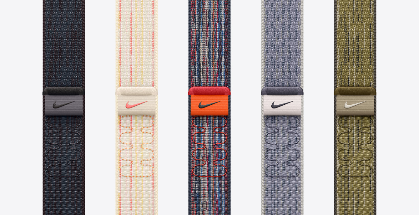 Five Nike Sport Loops in colors including Black/Blue, Starlight/Pink, Blue/Red, Grey/Blue, and Green/Grey