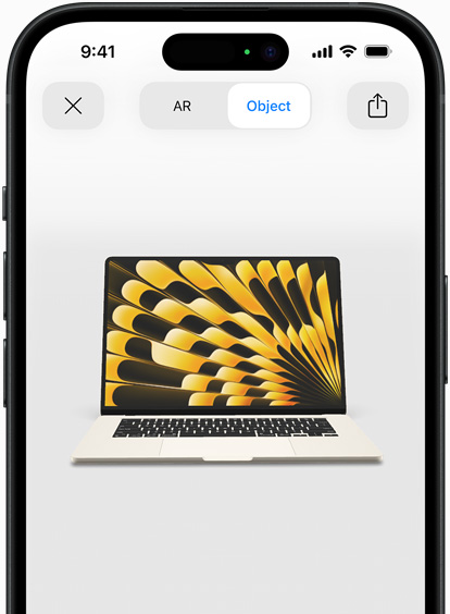 Esikatselu tähtivalkean MacBook Airin tarkastelemisesta lisätyssä todellisuudessa iPhonella