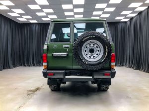 Back of green armored Toyota SUV