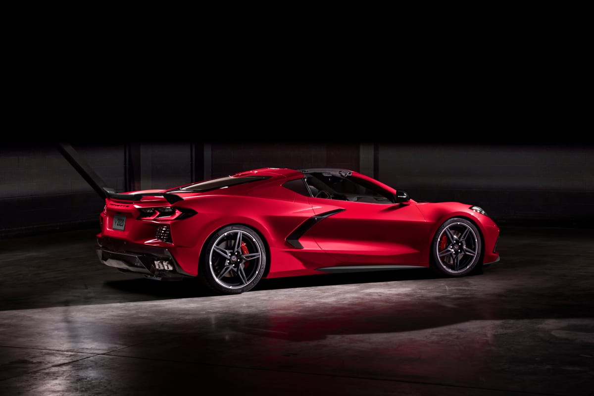 Rear angled side view of red Corvette Stingray