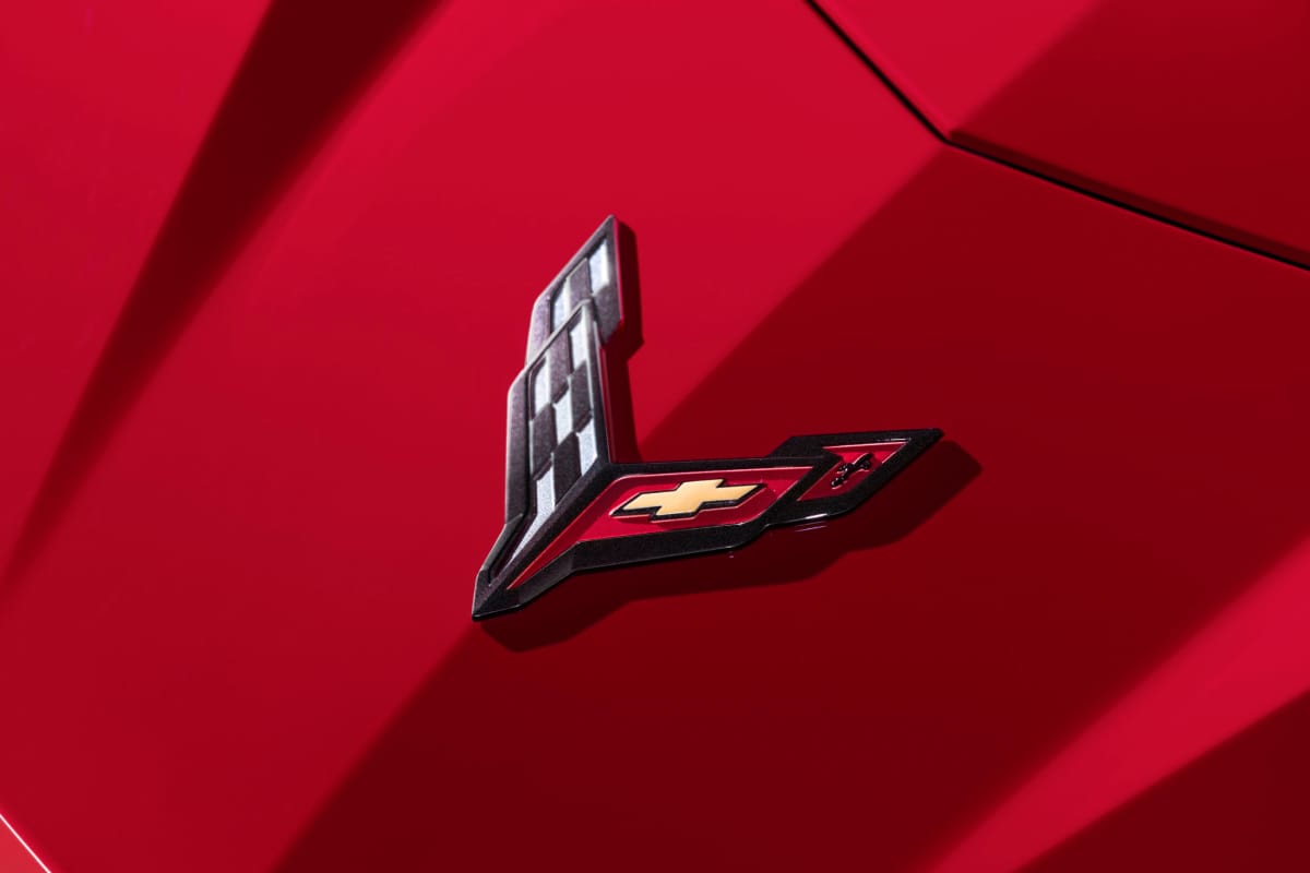 Close-up of red Corvette Stingray badge