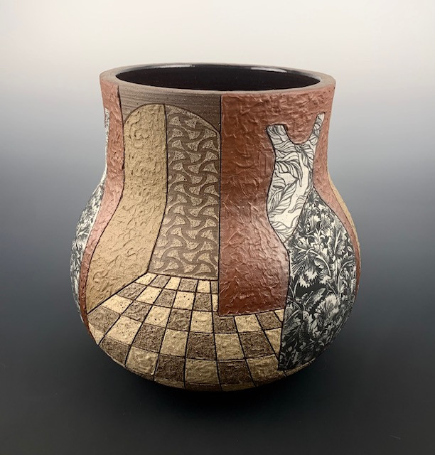 A multi-colored ceramic pot.