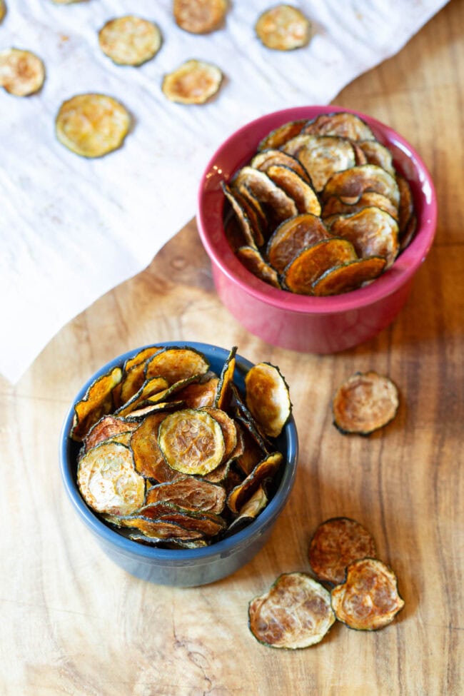 Baked Zucchini Chips - overhead shot of chips in two bowls