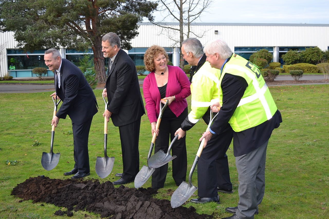 Breaking ground on Boeing Auburn’s future, 71,000-square-foot Workforce Readiness Center Dec. 1 are, from left to right: Jim Ockerman, vice president of manufacturing and safety for Boeing fabrication; Jack Meehan, Boeing Auburn’s site leader; Auburn Mayor Nancy Backus; Tom Kelleher, project manager for the new building at the Auburn site; and Danny Miller, leader for site services at Boeing Auburn and in Frederickson. ROBERT WHALE, Auburn Reporter