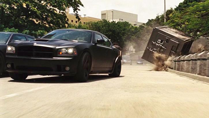 We could probably make an entire list of F and F car chases – maybe we will when the series’ eighty entry drops in two years – but if one stands out above them all, it has to be the manic blast through Rio de Janeiro involving two heavily-modified Dodge Chargers, a garbage truck, and about 600 different varieties of Rio police cruiser, including a Ford Explorer that meets a particularly gory demise. Two Chargers, each hooked up to a safe – a SAFE! – that they literally yanked out of a wall as if it were a stubborn wisdom tooth, dragged through traffic decapitating everything that gets in their way and prompted everyone in the theatre to ask “how the HECK did they think of that?!?”