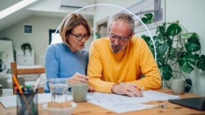 An older couple reviewing documents