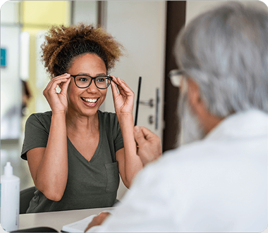 African american woman trying on glasses