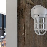 White Bunker Wall Light on Timber Wall