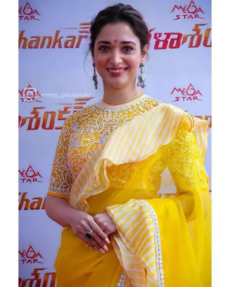 Plain Yellow Saree With Ruffles And Designer Blouse