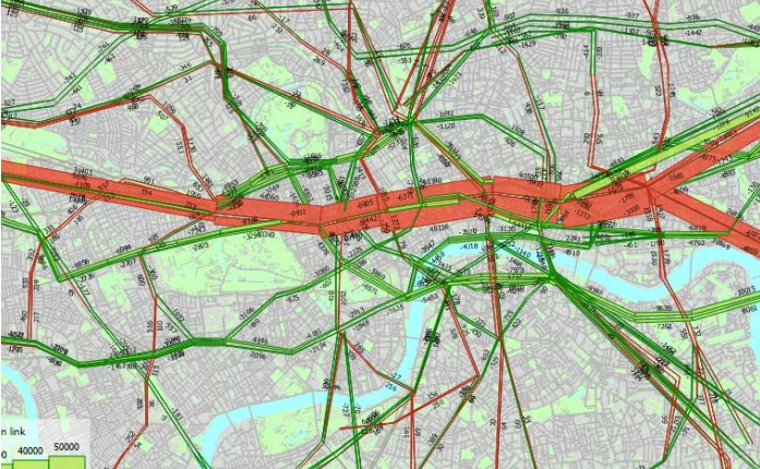 A detailed map by Transport for London displays traffic flow with green, red, and orange lines, indicating varying congestion levels on city roads.