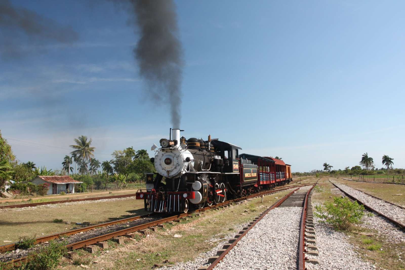 A steam train passing near Remedios in Cuba