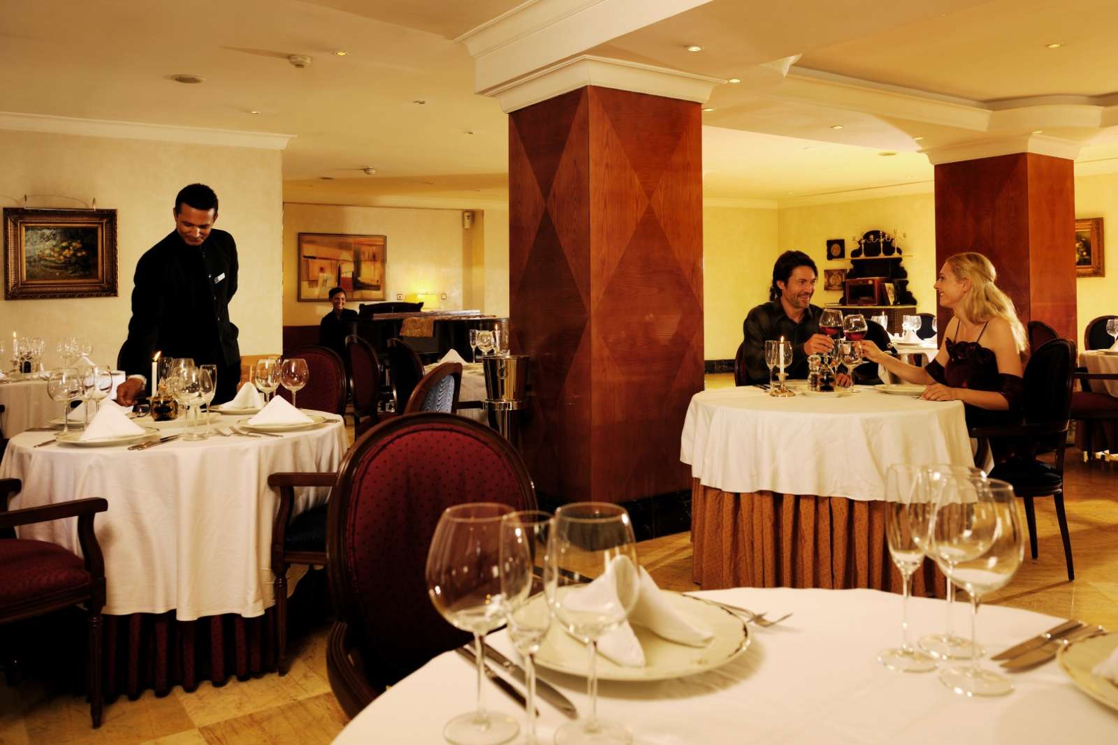 Couple dining at the Parque Central hotel in Havana, Cuba