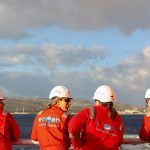 Left to right: Luzie Schnieders (MARUM), Nancy Prouty (USGS), Hannah Grant (BGS) and Mary Mowat (BGS) on the deck as the MMA Valour sets sail. Photo credit MarleyParker@ECORD_IODP