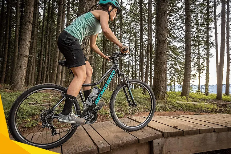 woman riding a cheap mountain bike