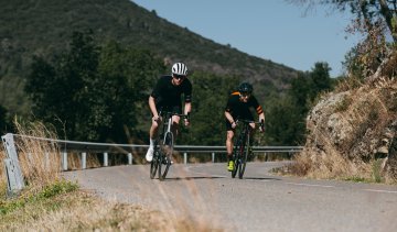 Mark and Franjo from the bc Team sprint out of a corner on new Cannondale SuperSix EVO road bikes.