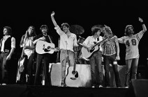 Joe Vitale, Timothy B. Schmit, J.D. Souther, Glenn Frey, Don Henley, Joe Walsh and Don Felder of the Eagles following their performance at the San Diego Sports Arenain December 1979 in San Diego, California.