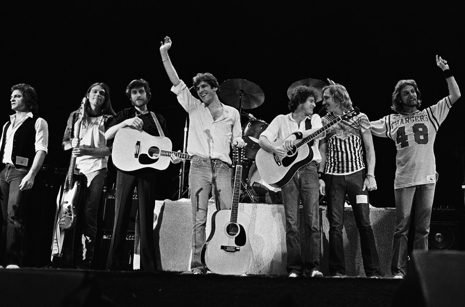 Joe Vitale, Timothy B. Schmit, J.D. Souther, Glenn Frey, Don Henley, Joe Walsh and Don Felder of the Eagles following their performance at the San Diego Sports Arenain December 1979 in San Diego, California.