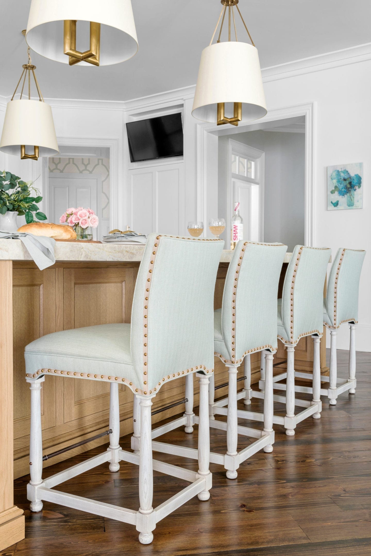 Blue Counter Stools covered in Sunbrella fabric with White Dove Benjamin Moore paint.