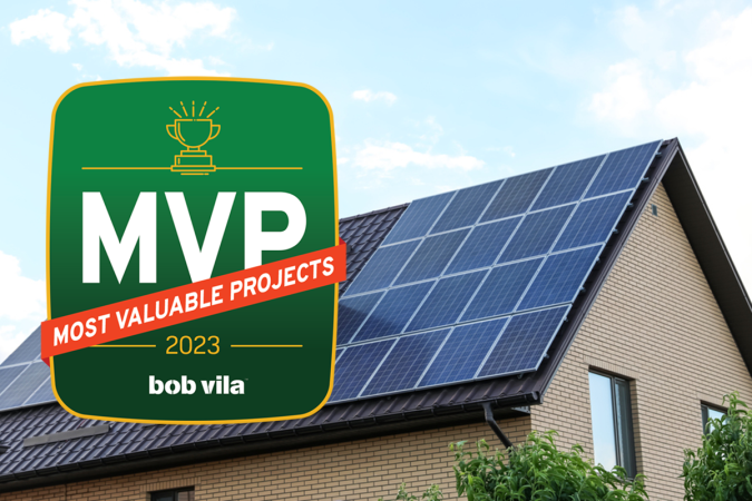 rooftop solar panels installed on a brick house with Bob Vilas most valuable projects graphic overlay