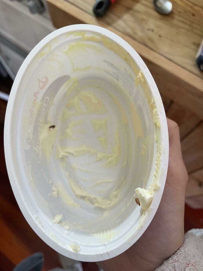 Almost empty butter container, illustrating habits of infuriating people.