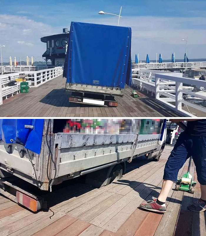 Truck stuck on a wooden pier due to careless parking by lazy-infuriating-people, showing poor planning and obstruction.