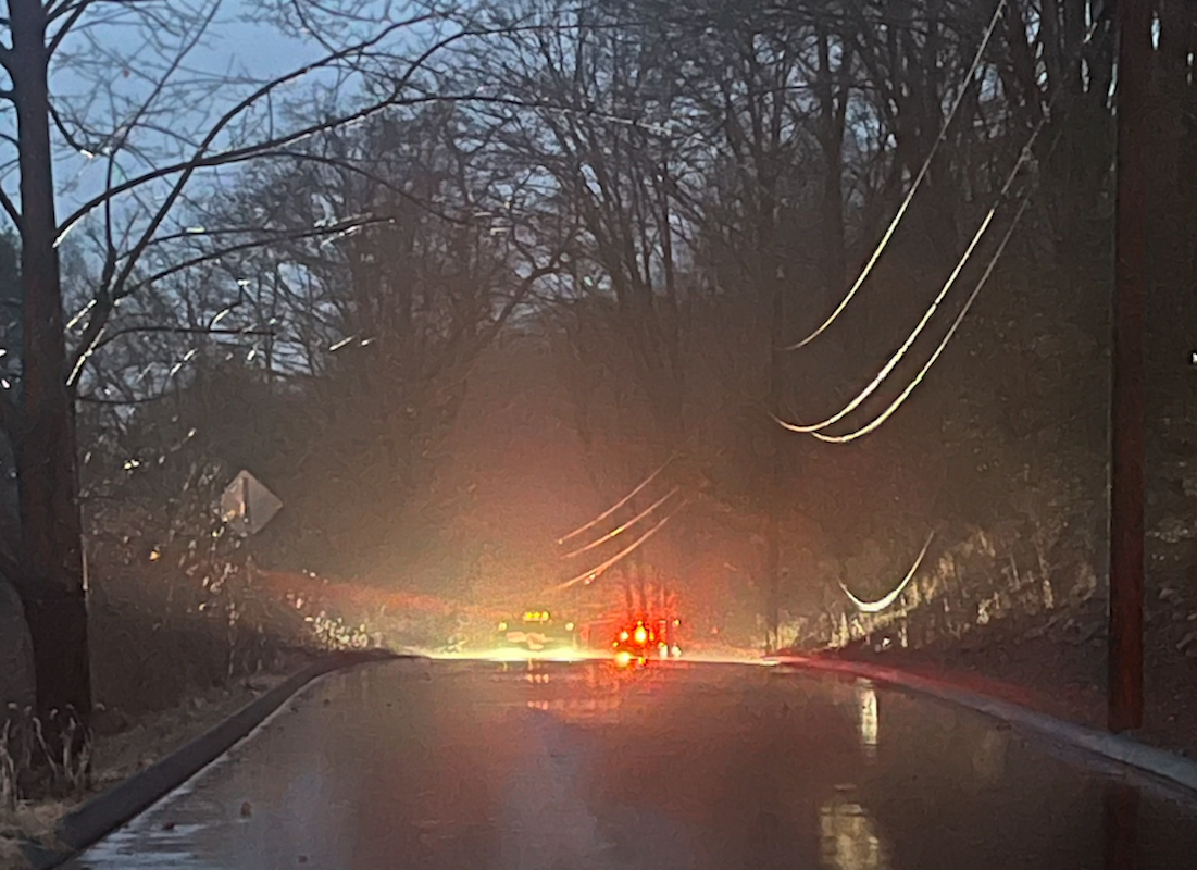 Power line falls on bus during storm in Conn.