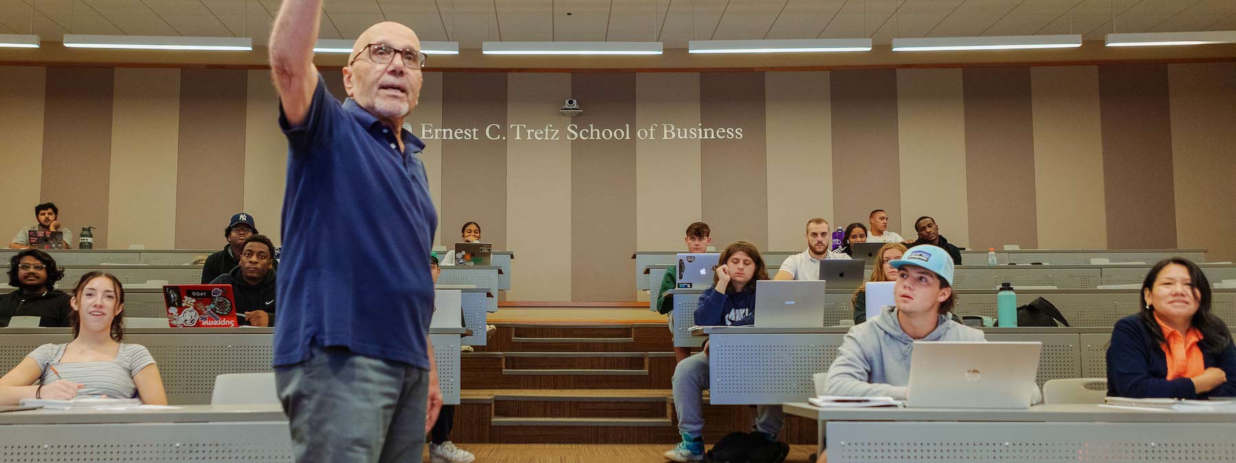 Professor teaching a class in a lecture hall