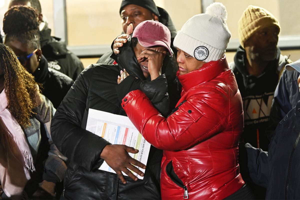 people crying at vigil for health campbell