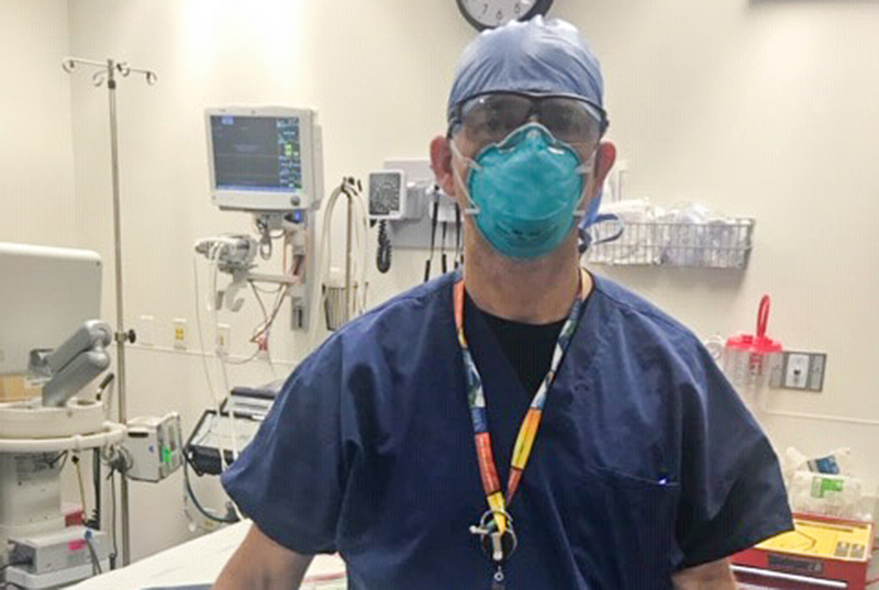 Boston Medical Center doctor Evan Berg wearing his PPE gear on shift at the hospital