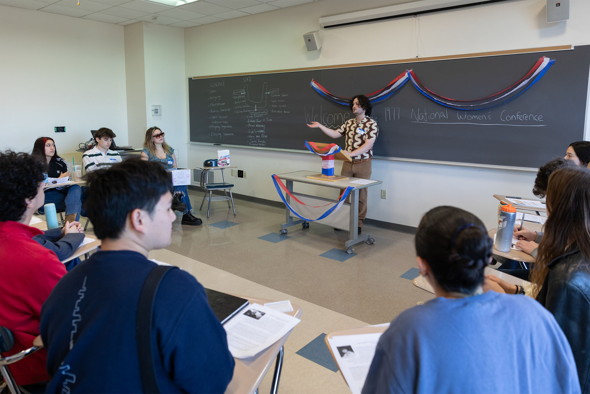 Photo:XCC-Back to the Past-0799-sm: Evan Denenberg (Wheelock’25) presenting to the class about the 1972 Equal Rights Amendment.